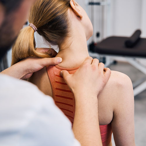Square One | Physiotherapy | Homepage Tile | image focus manipulating neck, shoulders area
